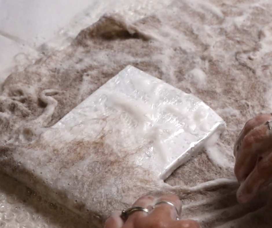 using a styrofoam form to shape wet felt into a rustic bag