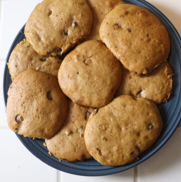 a plate of pumpkin chocolate chip cookies
