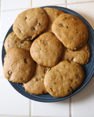 a plate of pumpkin chocolate chip cookies