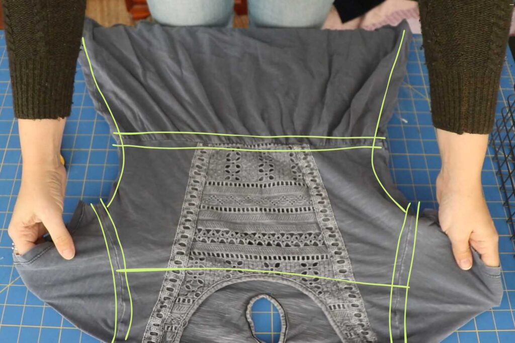 a t-shirt  about to be upcycled, with cutting lines drawn on the image