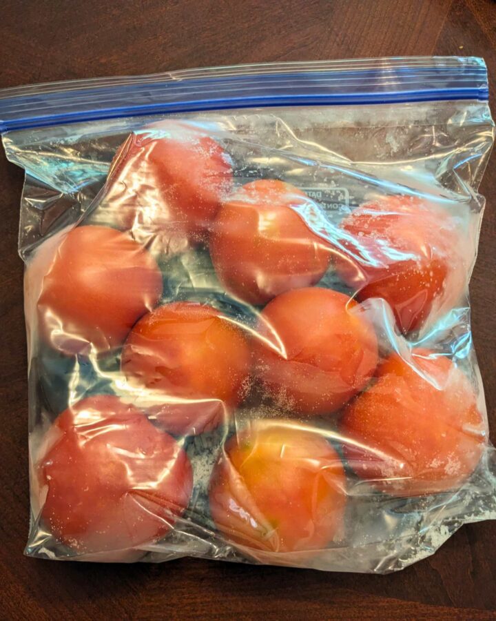 a gallon bag full of frozen tomatoes