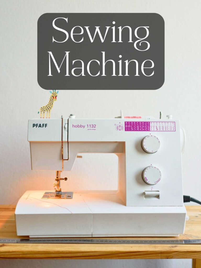 a white pfaff sewing machine on a table